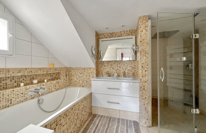 master bedroom suite with dressing room and bathroom