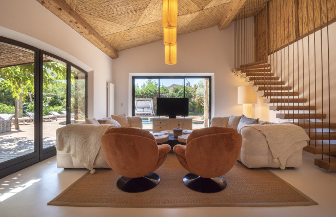 bright living room with pool access